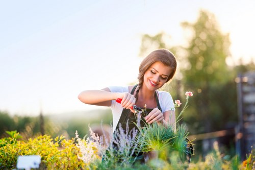 Landscapers preparing safely for garden waste removal in Forest Gate